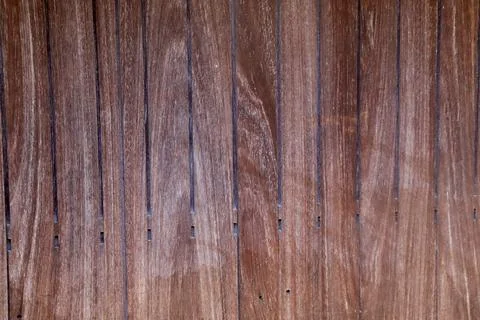 Abstract background showcasing vertical lines of weathered timber board Stock Photos