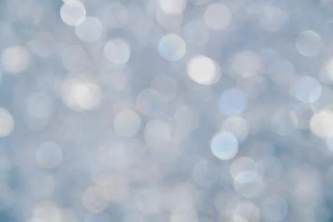 Abstract background of silver blue bokeh lights Stock Photos