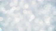 Abstract Background Of Silver Bokeh Spinning Stock Footage