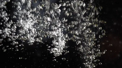 Abstract background from slow motion moving bubbles of air in water Stock Footage 98484066