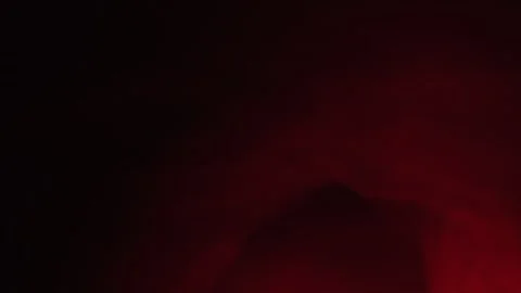 Abstract Background Slow Motion Shot of Red Smoke on Black Stock Footage 313532421