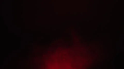 Abstract Background Slow Motion Shot of Red Smoke on Black Stock Footage 315429480