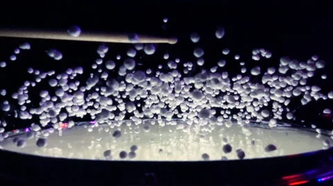 Abstract background with small balls on drums slow motion Video stock 59149351
