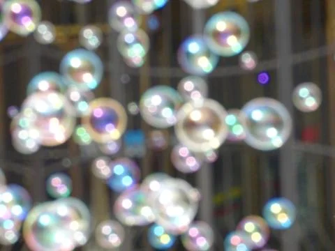 Abstract background with soap bubbles in the air. Blurred defocused artistic  Stock Photos