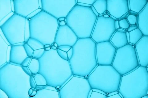 Abstract background of soap bubbles on blue background Stock Photos