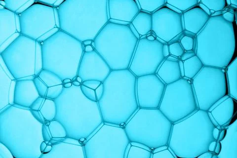 Abstract background of soap bubbles on blue background Stock Photos
