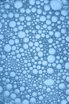 Abstract background of soap bubbles on blue background Stock Photos