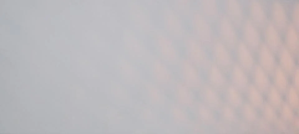 Abstract background with a soft diamond gradient from white to light blue. Stock Photos