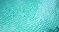 Abstract Background of Sparkling Blue Water in a Swimming Pool HD Footage