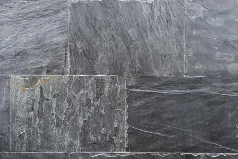 Abstract background of stone slabs in dark gray color. Stock Photos