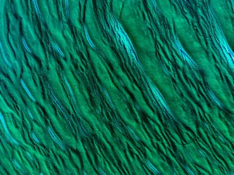 Abstract background from a surface in blue Stock Photos