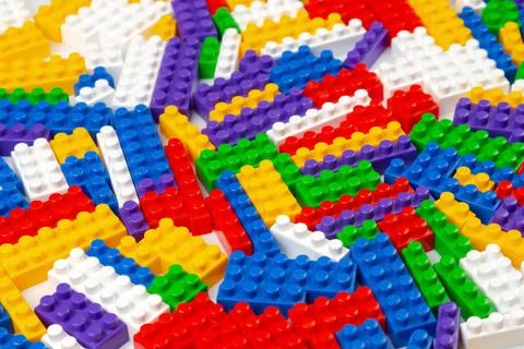 Abstract background texture of colored constructor blocks. Background of colo Stock Photos