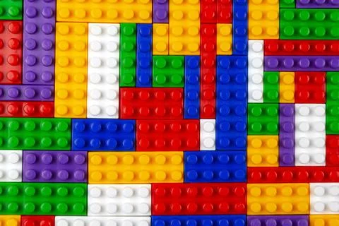Abstract background texture of colored constructor blocks. Background of colo Stock Photos