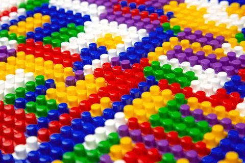 Abstract background texture of colored constructor blocks. Background of colo Stock Photos