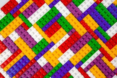 Abstract background texture of colored constructor blocks. Background of co.. Stock Photos