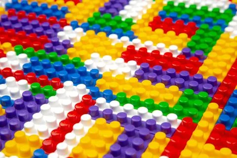 Abstract background texture of colored constructor blocks. Background of co.. Stock Photos