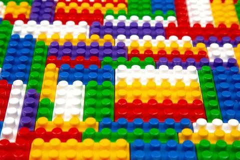 Abstract background texture of colored constructor blocks. Background of co.. Stock Photos