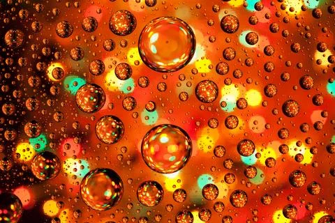 Abstract background texture drops of water and art light on glass. Creative.. Stock Photos