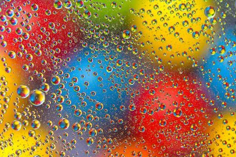 Abstract background texture in the form of blurry color round spots Stock Photos