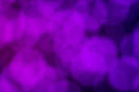 Abstract background texture with purple blurred bokeh effect Stock Photos