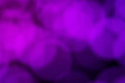 Abstract background texture with purple blurred bokeh effect Stock Photos