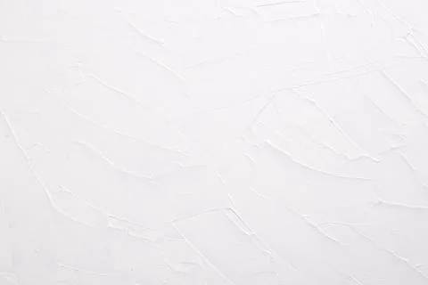 Abstract background texture of strokes of white art paint on canvas. Foto stock