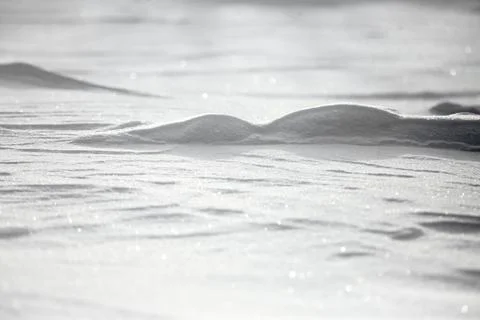 Abstract background texture of the surface of the white snow in winter Stock Photos