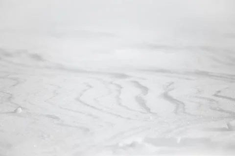 Abstract background texture of the surface of the white snow in winter Stock Photos