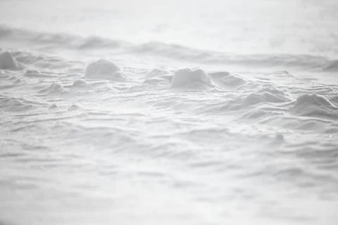 Abstract background texture of the surface of the white snow in winter Stock Photos