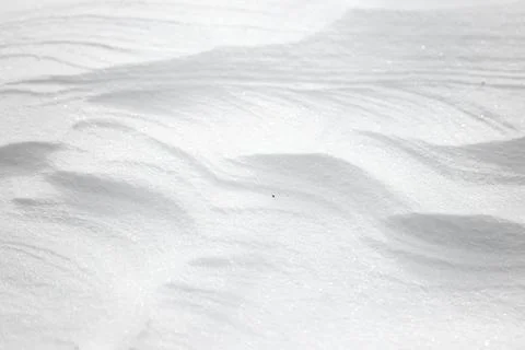 Abstract background texture of the surface of the white snow in winter Stock Photos
