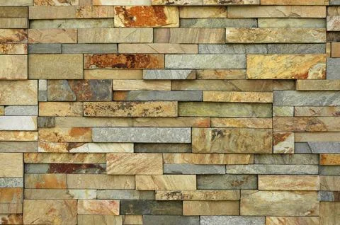 Abstract Background Texture of a Wall With Irregular Sized Bricks Stock Photos