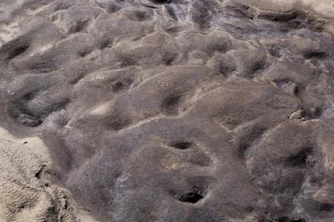 Abstract background texture of wet sand and clay Stock Photos