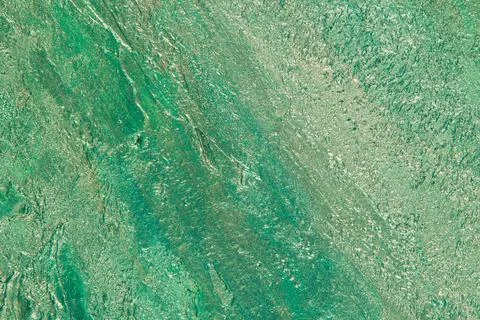 Abstract background: textured plaster with emerald turquoise color, close Stock Photos