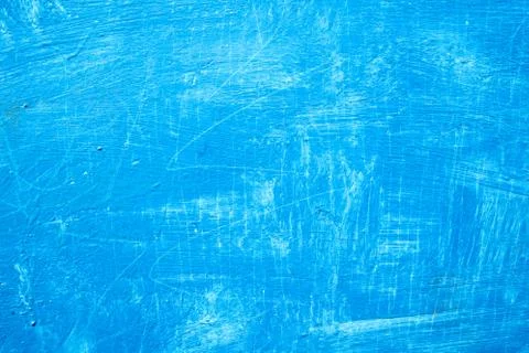 Abstract background with textured strokes of blue paint on the wooden surface Stock Illustration