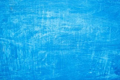 Abstract background with textured strokes of blue paint on the wooden surface Stock Illustration