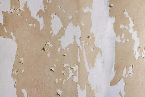 Abstract background of torn wallpaper on the wall. Repair. Stock Photos