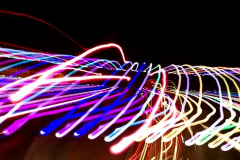 Abstract background of traced lights in the dark Stock Illustration