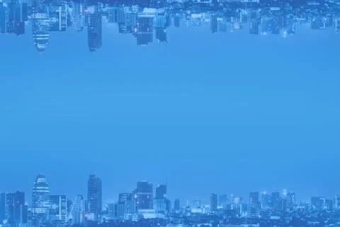 Abstract background upside down cityscape and space for copy with blue tone. Stock Photos