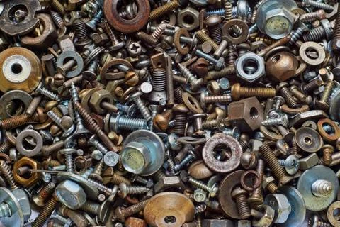 Abstract background with various screws, nuts, bolts and washers and other fa Stock Photos