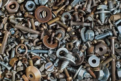 Abstract background with various screws, nuts, bolts and washers and other fa Stock Photos
