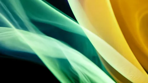 Abstract background of vibrant smoke trails dancing wildly, curling and Stock Footage 310309882