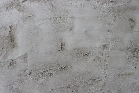 Abstract background from a wall covered with gray plaster. Stock Photos