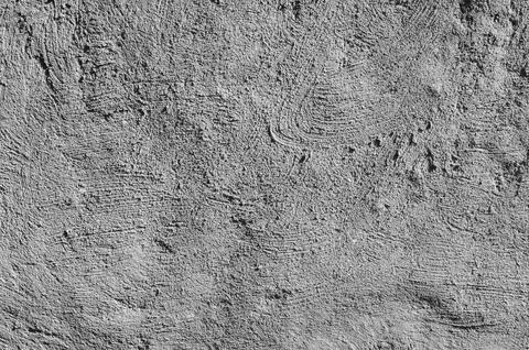 Abstract background from a wall with old gray plaster. Stock Photos