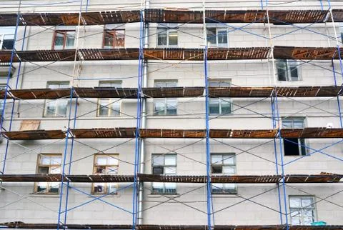 Abstract background a wall with scaffolding Stock Photos