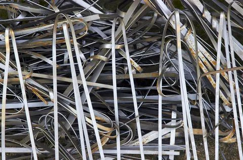 Abstract background of waste of metal processing on a laser cutting machine Stock Photos