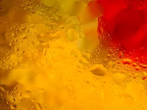 Abstract background with water droplets on a surface, creating a vibrant in.. 스톡 사진