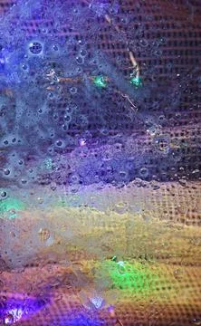 Abstract background with water drops and colored lighting Stock Photos