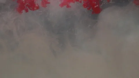 Abstract background, water, red dye flowing in clouds Stock Footage 101709786