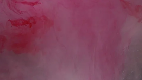 Abstract background, water, red dye and glitter flowing in waves Stock Footage 101979649