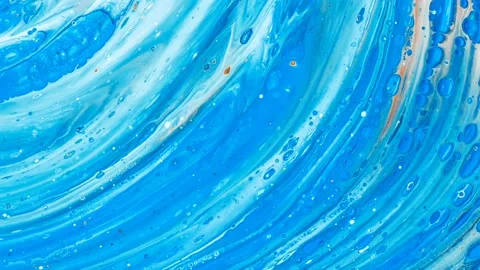 Abstract background of water ripple wave motion, colorful liquid paint. 4K Stock Footage 208947857